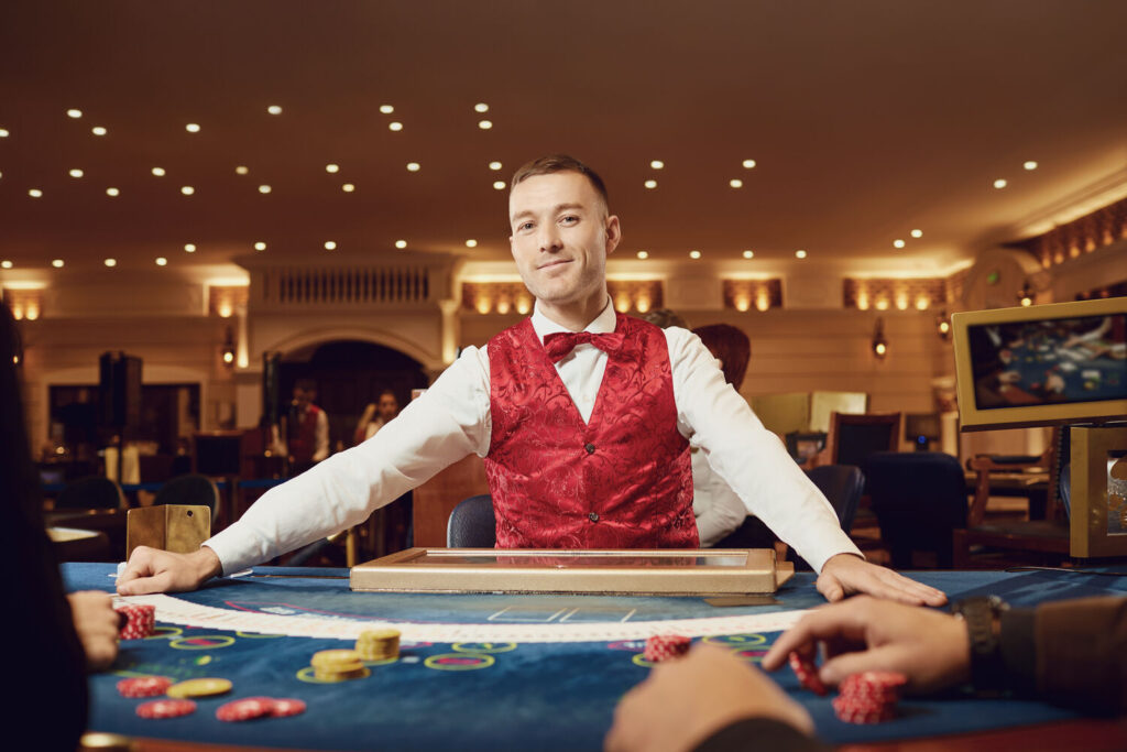Casino dealer at the table