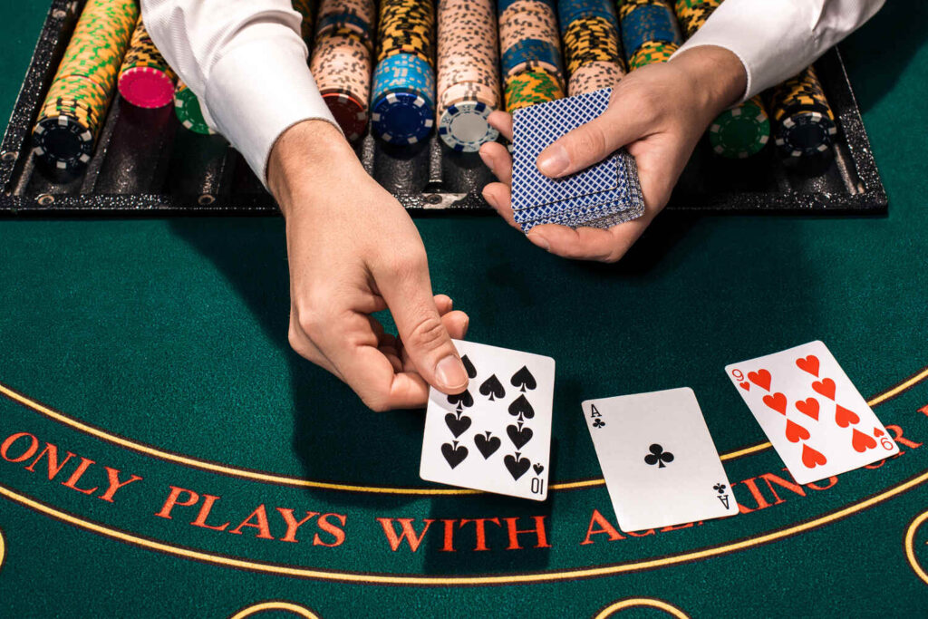 Dealer handling cards and chips
