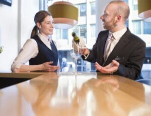 Manager training a member of staff