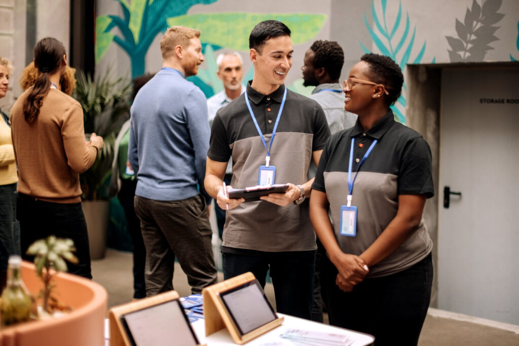 Event Staff Checking In Attendees at a Corporate Function