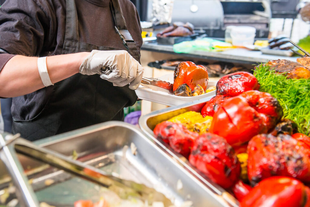 Serving Grilled Vegetables at a Food Station